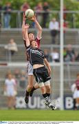 27 June 2010; Thomas Flynn, Galway, in action against Cathal Finneran, Sligo. ESB Connacht GAA Football Minor Championship Semi-Final, Galway v Sligo, Pearse Stadium, Galway. Picture credit: Diarmuid Greene / SPORTSFILE