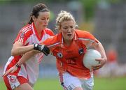 27 June 2010; Kelly Mallon, Armagh, in action against Maura Kelly, Tyrone. TG4 Ladies Football Ulster Senior Championship Semi-Final, Tyrone v Armagh, Kingspan Breffni Park, Cavan. Picture credit: Oliver McVeigh / SPORTSFILE