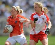 27 June 2010; Kelly Mallon, Armagh, in action against Neamh Woods, Tyrone. TG4 Ladies Football Ulster Senior Championship Semi-Final, Tyrone v Armagh, Kingspan Breffni Park, Cavan. Picture credit: Oliver McVeigh / SPORTSFILE