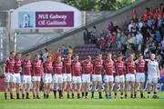 27 June 2010; The Galway team stand together for the National Anthem after a minute's silence to honour the career of the late Roscommon player Dermot Earley. Connacht GAA Football Senior Championship Semi-Final, Galway v Sligo, Pearse Stadium, Galway. Picture credit: Diarmuid Greene / SPORTSFILE