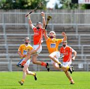 27 June 2010; James King, Armagh, in action against Andy McGowan, Antrim. ESB Ulster GAA Hurling Minor Championship Final, Antrim v Armagh, Casement Park, Belfast. Picture credit: Michael Cullen / SPORTSFILE