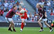 27 June 2010; Niamh Quigley, Louth, in action against Rebecca Nic Aogain, left, and Nicola Mullen, Westmeath, during the Half-time Go Games at the Leinster GAA Football Semi-Finals. Croke Park, Dublin. Picture credit: Brendan Moran / SPORTSFILE