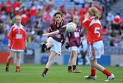 27 June 2010; Shannon Lyons, Westmeath, in action against Aoibheann Smith, Louth, during the Half-time Go Games at the Leinster GAA Football Semi-Finals. Croke Park, Dublin. Picture credit: Brendan Moran / SPORTSFILE