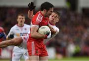 22 May 2016; Oisin Duffy of Derry in action against Mark Bradley of Tyrone during the Ulster GAA Football Senior Championship, Quarter-Final, at Celtic Park, Derry. Photo by Sportsfile