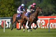 3 June 2016; War Decree, with Donnacha O'Brien up, races alongside Orderofthegarter, with Emmet McNamara up, on their way to winning the Irish Stallion Farms European Breeders Fund Maiden the British Irish Chamber of Commerce Raceday in Leopardstown, Co. Dublin. Photo by Cody Glenn/Sportsfile