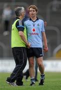 29 June 2010; Dublin's Luke Fletcher is consoled by manager Val Andrews after defeat. ESB Leinster GAA Football Minor Championship Quarter-Final Replay, Dublin v Kildare, Pairc Tailteann, Navan, Co. Meath. Picture credit: Brian Lawless / SPORTSFILE