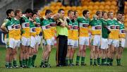 30 June 2010; Offaly manager Ken Kellaghan stands with his players for the national anthem. ESB Leinster GAA Football Minor Championship Semi-Final, Offaly v Laois, O'Connor Park, Tullamore, Co. Offaly. Picture credit: Brian Lawless / SPORTSFILE