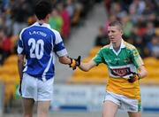 30 June 2010; Offaly's Cian Donohoe shakes hands with Jason Campion, Laois, after Offaly's victory. ESB Leinster GAA Football Minor Championship Semi-Final, Offaly v Laois, O'Connor Park, Tullamore, Co. Offaly. Picture credit: Brian Lawless / SPORTSFILE