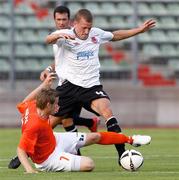 1 July 2010; Thomas Miller, Dundalk, in action against Sebastien Hartung, CS Grevenmacher. UEFA Europa League First Qualifying Round - 1st Leg, CS Grevenmacher v Dundalk, Josy Barthel Stadium, Luxembourg. Picture credit: Gerry Schmit / SPORTSFILE