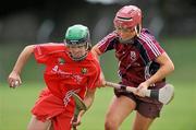 3 July 2010; Julia White, Cork, in action against Heather Cooney, Galway. Gala All-Ireland Senior Championship, Galway v Cork, Kenny Park, Athenry, Co. Galway. Picture credit: Diarmuid Greene / SPORTSFILE