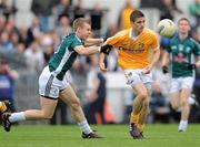 3 July 2010; Sean Kelly, Antrim, in action against Morgan O'Flaherty, Kildare. GAA Football All-Ireland Senior Championship Qualifier Round 1 Replay, Antrim v Kildare, Casement Park, Belfast, Co. Antrim. Photo by Sportsfile