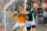 3 July 2010; Kevin McGourty, Antrim, in action against Ronan Sweeney, Kildare. GAA Football All-Ireland Senior Championship Qualifier Round 1 Replay, Antrim v Kildare, Casement Park, Belfast, Co. Antrim. Photo by Sportsfile