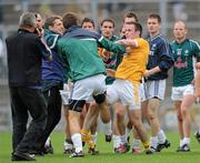 3 July 2010; Kildare manager Kieran McGeeney intervenes in a row between William Heffernan, Kildare and Michael McCann, Antrim, at the end of the game. GAA Football All-Ireland Senior Championship Qualifier Round 1 Replay, Antrim v Kildare, Casement Park, Belfast, Co. Antrim. Photo by Sportsfile