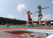 4 June 2016; Amy O'Brien of Dominican College and Laura Nicholson of Bandon Grammar School, Wicklow, competing in the Intermediate Girls 1500m Steeplechase at the GloHealth All Ireland Schools Track & Field Championships 2016. Tullamore Harriers Sports Complex, Co. Offaly Photo by Sam Barnes/Sportsfile