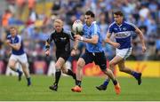 4 June 2016; Michael Darragh Macauley of Dublin in action against Colm Begley of Laois in the Leinster GAA Football Senior Championship Quarter-Final match between Laois and Dublin in Nowlan Park, Kilkenny. Photo by Stephen McCarthy/Sportsfile