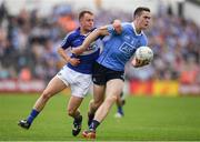 4 June 2016; Brian Fenton of Dublin in action against Damien O'Connor of Laois in the Leinster GAA Football Senior Championship Quarter-Final match between Laois and Dublin in Nowlan Park, Kilkenny. Photo by Stephen McCarthy/Sportsfile