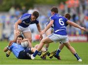 4 June 2016; Kevin McManamon of Dublin in action against Laois players, from left, John O'Loughlin, Evan O'Carroll and Darren Strong during the Leinster GAA Football Senior Championship Quarter-Final match between Laois and Dublin in Nowlan Park, Kilkenny. Photo by Stephen McCarthy/Sportsfile