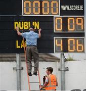 4 June 2016; Groundsman Timmy Grogan adjusts the scoreboard before the Leinster GAA Football Senior Championship Quarter-Final match between Laois and Dublin in Nowlan Park, Kilkenny. Picture credit: Dáire Brennan / SPORTSFILE