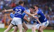 4 June 2016; Diarmuid Connolly of Dublin in action against Kevin Meaney and Colm Begley of Laois during the Leinster GAA Football Senior Championship Quarter-Final match between Laois and Dublin in Nowlan Park, Kilkenny. Photo by Ray McManus/Sportsfile