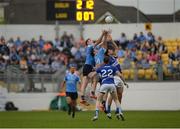 4 June 2016; Brian Fenton, left, and Denis Bastick of Dublin compete for the second half throw in against Kevin Meaney, left, and Brendan Quigley of Laois in the Leinster GAA Football Senior Championship Quarter-Final match between Laois and Dublin in Nowlan Park, Kilkenny. Picture credit: Dáire Brennan / SPORTSFILE