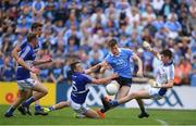 4 June 2016; Con O'Callaghan of Dublin has his shot on goal blocked by Laois goalkeeper Graham Brody and Stephen Attride during the Leinster GAA Football Senior Championship Quarter-Final match between Laois and Dublin in Nowlan Park, Kilkenny. Photo by Stephen McCarthy/Sportsfile