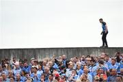 4 June 2016; A Dublin supporter looks for a position in the City Terrace ahead of the Leinster GAA Football Senior Championship Quarter-Final match between Laois and Dublin in Nowlan Park, Kilkenny. Photo by Stephen McCarthy/Sportsfile