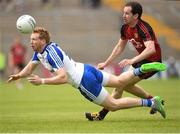 5 June 2016; Kieran Hughes of Monaghan in action against Conaill McGovern of Down in the Ulster GAA Football Senior Championship Quarter-Final between Monaghan and Down in St Tiernach's Park, Clones, Co. Monaghan. Picture by Philip Fitzpatrick/Sportsfile.