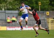 5 June 2016; Darren Hughes of Monaghan in action against Kevin McKernan of Down in the Ulster GAA Football Senior Championship Quarter-Final between Monaghan and Down in St Tiernach's Park, Clones, Co. Monaghan. Photo by Oliver McVeigh/Sportsfile
