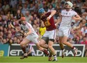 5 June 2016; Tommy Doyle of Westmeath in action against Jason Flynn, right, and Conor Whelan of Galway in the Leinster GAA Hurling Senior Championship Quarter-Final between Westmeath and Galway in TEG Cusack Park, Mullingar, Co. Westmeath. Photo by Piaras Ó Mídheach/Sportsfile