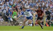 5 June 2016; Conor McCarthy of Monaghan in action against Gerard Collins of Down in the Ulster GAA Football Senior Championship Quarter-Final between Monaghan and Down in St Tiernach's Park, Clones, Co. Monaghan. Picture credit: Dáire Brennan / SPORTSFILE
