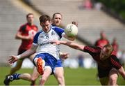 5 June 2016; Conor McManus of Monaghan in action against Gerard McGovern of Down in the Ulster GAA Football Senior Championship Quarter-Final between Monaghan and Down in St Tiernach's Park, Clones, Co. Monaghan. Photo by Oliver McVeigh/Sportsfile