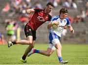 5 June 2016; Darren Hughes of Monaghan in action against Henry Brown of Down in the Ulster GAA Football Senior Championship Quarter-Final between Monaghan v Down in St Tiernach's Park, Clones, Co. Monaghan. Photo by Oliver McVeigh/Sportsfile