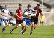 5 June 2016; Darren Hughes of Monaghan in action against Henry Brown of Down in the Ulster GAA Football Senior Championship Quarter-Final between Monaghan and Down in St Tiernach's Park, Clones, Co. Monaghan. Photo by Oliver McVeigh/Sportsfile