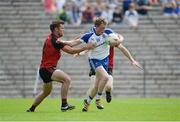 5 June 2016; Ryan McAnespie of Monaghan in action against Gerard Collins of Down in the Ulster GAA Football Senior Championship Quarter-Final between Monaghan and Down in St Tiernach's Park, Clones, Co. Monaghan. Photo by Dáire Brennan / SPORTSFILE