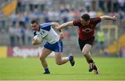 5 June 2016; Dermot Malone of Monaghan in action against Aidan Carr of Down in the Ulster GAA Football Senior Championship Quarter-Final between Monaghan and Down in St Tiernach's Park, Clones, Co. Monaghan. Photo by Daire Brennan/Sportsfile