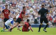 5 June 2016; David McKibbin of Down in action against Kieran Hughes of Monaghan in the Ulster GAA Football Senior Championship Quarter-Final between Monaghan and Down in St Tiernach's Park, Clones, Co. Monaghan. Photo by Dáire Brennan / SPORTSFILE