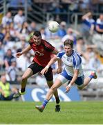 5 June 2016; Darren Hughes of Monaghan in action against Henry Brown of Down in the Ulster GAA Football Senior Championship Quarter-Final between Monaghan and Down in St Tiernach's Park, Clones, Co. Monaghan. Photo by Daire Brennan/Sportsfile