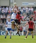 5 June 2016; Darren Hughes of Monaghan in action against Kevin McKernan of Down in the Ulster GAA Football Senior Championship Quarter-Final between Monaghan and Down in St Tiernach's Park, Clones, Co. Monaghan. Photo by Dáire Brennan / SPORTSFILE