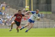 5 June 2016; Vinny Corey of Monaghan in action against Mark Poland of Down in the Ulster GAA Football Senior Championship Quarter-Final between Monaghan and Down in St Tiernach's Park, Clones, Co. Monaghan. Photo by Daire Brennan/Sportsfile