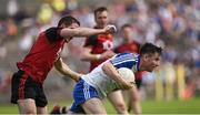 5 June 2016; Karl O'Connell of Monaghan in action against Aidan Carr of Down in the Ulster GAA Football Senior Championship Quarter-Final between Monaghan and Down in St Tiernach's Park, Clones, Co. Monaghan. Photo by Oliver McVeigh/Sportsfile