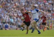 5 June 2016; Mark Poland of Down in action against Colin Walshe of Monaghan in the Ulster GAA Football Senior Championship Quarter-Final between Monaghan and Down in St Tiernach's Park, Clones, Co. Monaghan. Photo by Daire Brennan/Sportsfile