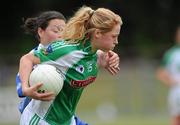 3 July 2010; Catrions Davis, Limerick, in action against Nora Dunphy, Waterford. TG4 Ladies Football Munster Intermediate Championship Final, Waterford v Limerick, Castletownroche GAA Grounds, Castletownroche, Co. Cork. Picture credit: Matt Browne / SPORTSFILE
