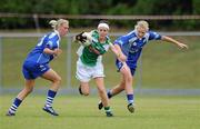 3 July 2010; Leanne Higgins, Limerick, in action against Mairead Wall and Elaine Power, 9, Waterford. TG4 Ladies Football Munster Intermediate Championship Final, Waterford v Limerick, Castletownroche GAA Grounds, Castletownroche, Co. Cork. Picture credit: Matt Browne / SPORTSFILE