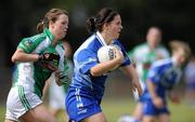3 July 2010; Sinead Ryan, Waterford, in action against Alva Neary, Limerick. TG4 Ladies Football Munster Intermediate Championship Final, Waterford v Limerick, Castletownroche GAA Grounds, Castletownroche, Co. Cork. Picture credit: Matt Browne / SPORTSFILE