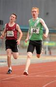 3 July 2010; Paul Manning, St. Joseph's, crosses the line ahead of Stephen Coleman, Athenry, Co. Galway, to win the U-14 Boy's 80m Final, during the Woodie's DIY AAI Juvenile Track & Field Championships. Tullamore Harriers Stadium, Tullamore, Co. Offaly. Picture credit: Barry Cregg / SPORTSFILE
