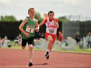 3 July 2010; Luke Morissey, Newbridge, Co. Kildare, crosses the line ahead of Alan Francis, Crusaders, to win the U-12 Boy's 60m Final, during the Woodie's DIY AAI Juvenile Track & Field Championships. Tullamore Harriers Stadium, Tullamore, Co. Offaly. Picture credit: Barry Cregg / SPORTSFILE