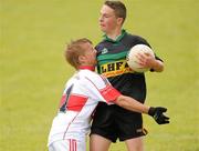 4 July 2010; Aaron Earley, right, Northern Gales, Longford, in action against Luke Power, De La Salle, Waterford, during the Division 4 Final. Coca-Cola GAA Féile Peil na nÓg Finals 2010, Celtic Park, Derry. Photo by Sportsfile