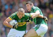 4 July 2010; Kieran Donaghy, Kerry, in action against Stephen Lucey, Limerick. Munster GAA Football Senior Championship Final, Kerry v Limerick, Fitzgerald Stadium, Killarney, Co. Kerry. Picture credit: Diarmuid Greene / SPORTSFILE