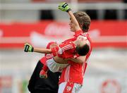 4 July 2010; Moy Davitts, Mayo, player Maks Babianwyk lifts team-mate Michael Guilfoyle after beating Stradbally, Laois, in the Division 2 Boys Final. Coca-Cola GAA Féile Peil na nÓg Finals 2010, Celtic Park, Derry. Photo by Sportsfile
