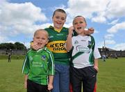 4 July 2010; Brothers Oisin Ferris, aged 5, and Conor Ferris, aged 7, supporting Limerick with big brother Eoin Ferris, aged 9, centre, supporting Kerry, from Listowel, Co. Kerry, before the game. Munster GAA Football Senior Championship Final, Kerry v Limerick, Fitzgerald Stadium, Killarney, Co. Kerry. Picture credit: Diarmuid Greene / SPORTSFILE
